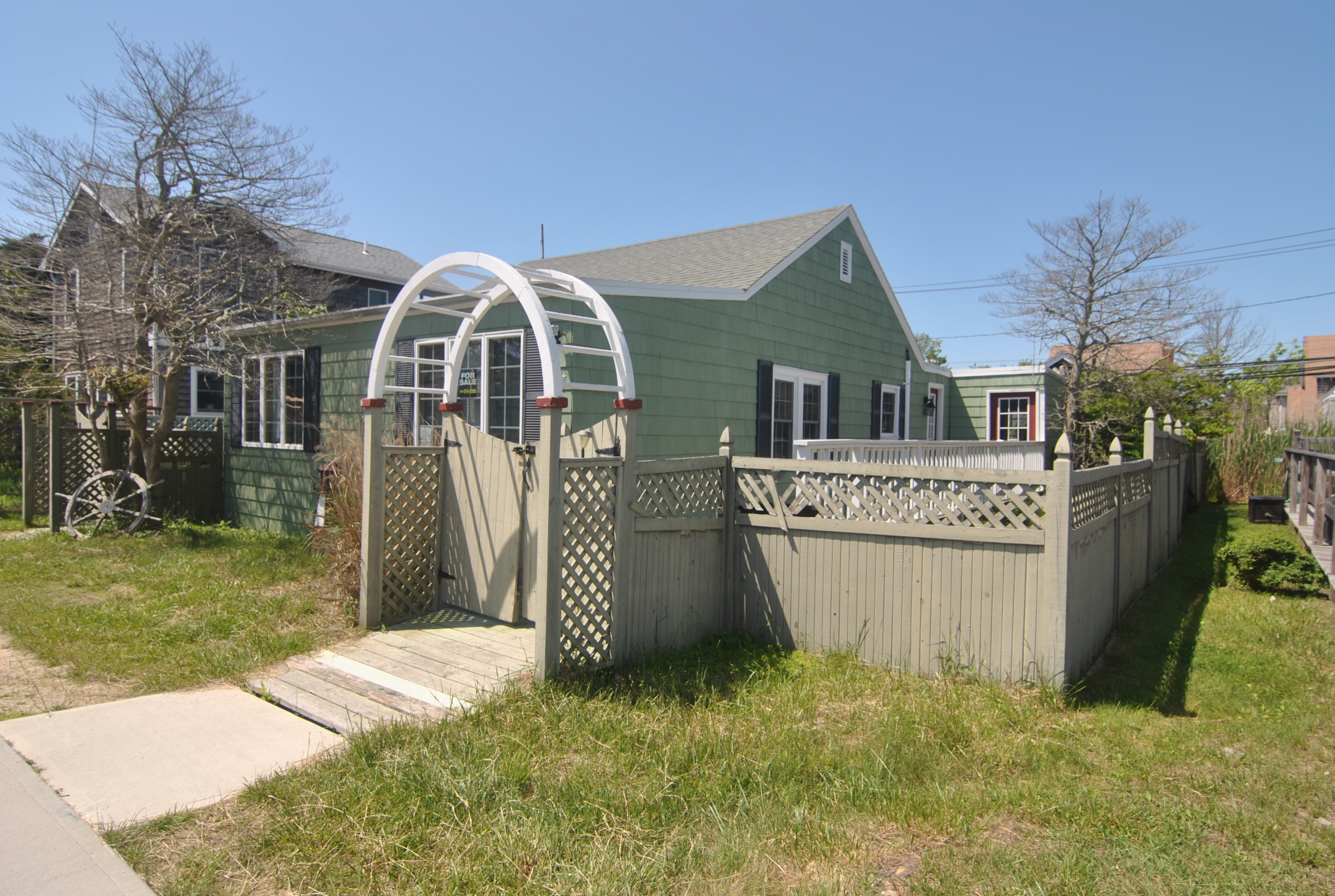This charming home is all updated. 4 bedrooms and 1.5 baths.  Open living and dining area. Sunny rear deck with outdoor shower and hot tub.  Quiet and convenient Ocean Beach location. Central air conditioning.  Great summer home or rental investment.  Seller financing available.