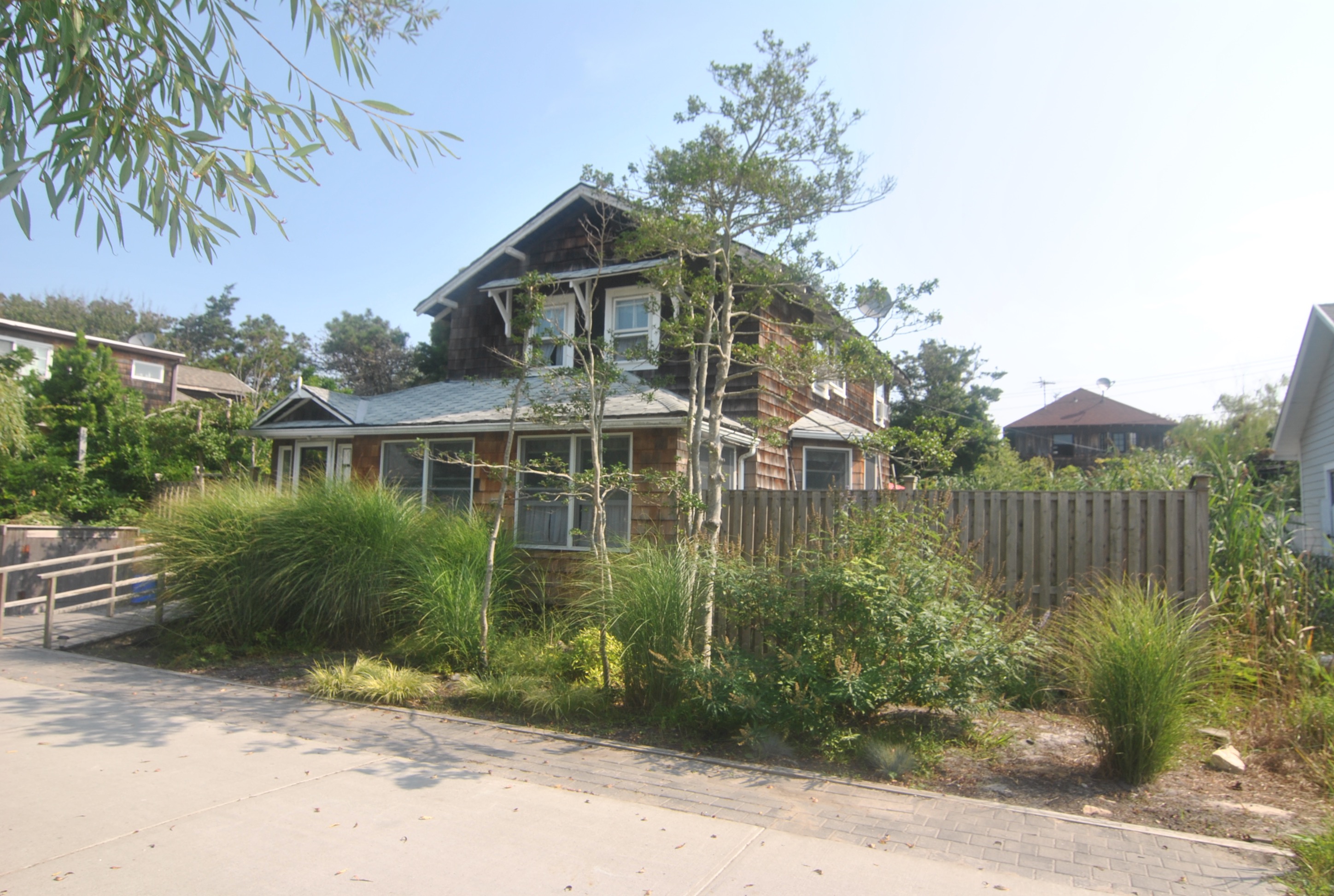 Exclusive Listing<br>
This charming Ocean Beach home is filled with traditional charm, but has been modernized for today's buyer.  The sun filled chef's kitchen has been renovated to perfection and has granite countertops, Viking range, a large table to accommodate the whole family and huge sliding glass doors leading to the spacious deck.  The home's 1.5 baths are fully renovated as well.    3 spacious bedrooms.  Great location on the beach block.  Must see to appreciate the fine finishes in this home.