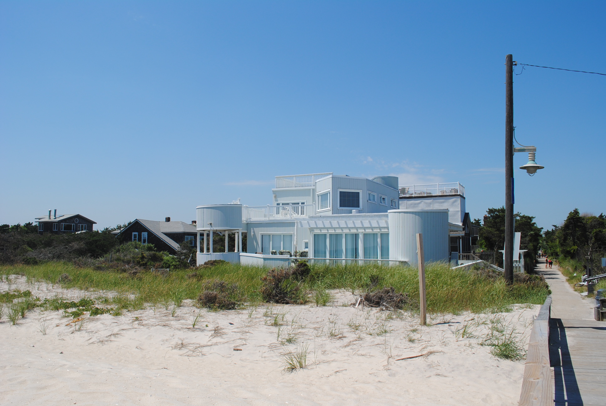 Large oceanfront home on desirable Ocean Beach block just listed!  Expansive decks. Renovated kitchen.  4 spacious bedrooms. 3.5 bathrooms.  Great value!