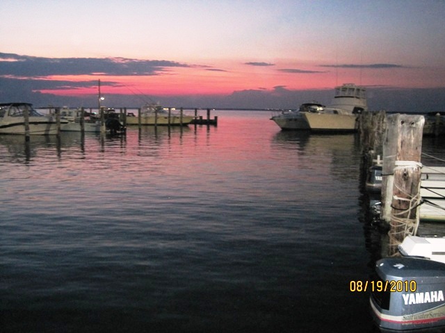 Beautiful sunsets and sunrises, 2 bedroom/2 bathroom duplex with unobstructed bay views from living room and dining area, as well as bedroom and upper and lower decks. Boat slip available.  Low Common Charges ($312/month) which include flood insurance!