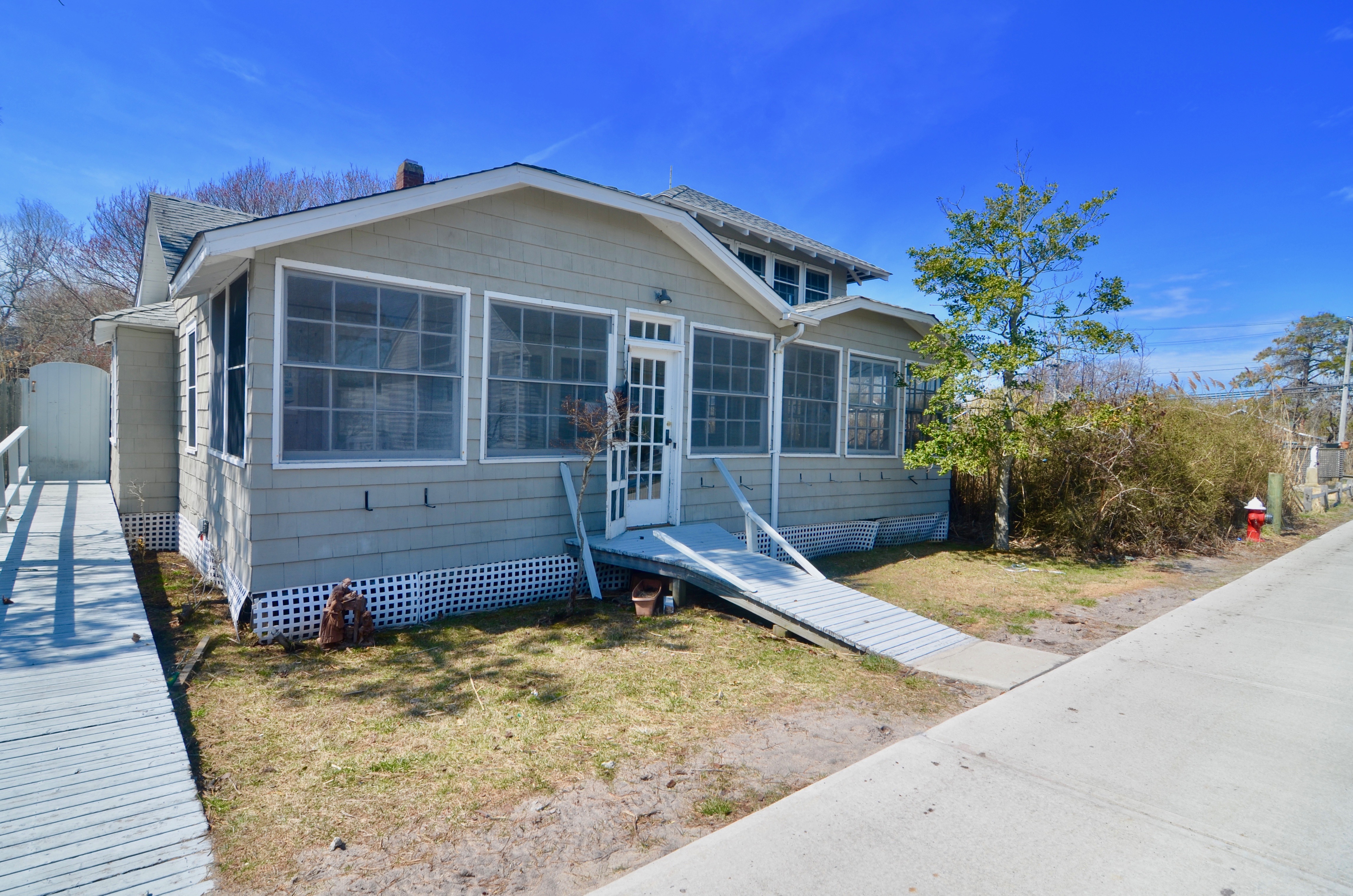 Classic Fire Island Cottage on ocean block. Charming home with 4 bedrooms, 1 full bath, 2 half baths and outdoor shower. Bright and airy space with large living and dining area that leads onto the enclosed front porch. Enclosed back porch with a half bath. Laundry inside off of kitchen. 3 bedrooms downstairs with a full bathroom. Master retreat upstairs with a half bath. Spacious East facing back deck with out door shower. This house is 2 minutes from the beach and 2 minutes to town. 
July- $14,000
August- $16,000
Memorial Day to Labor Day- $32,000