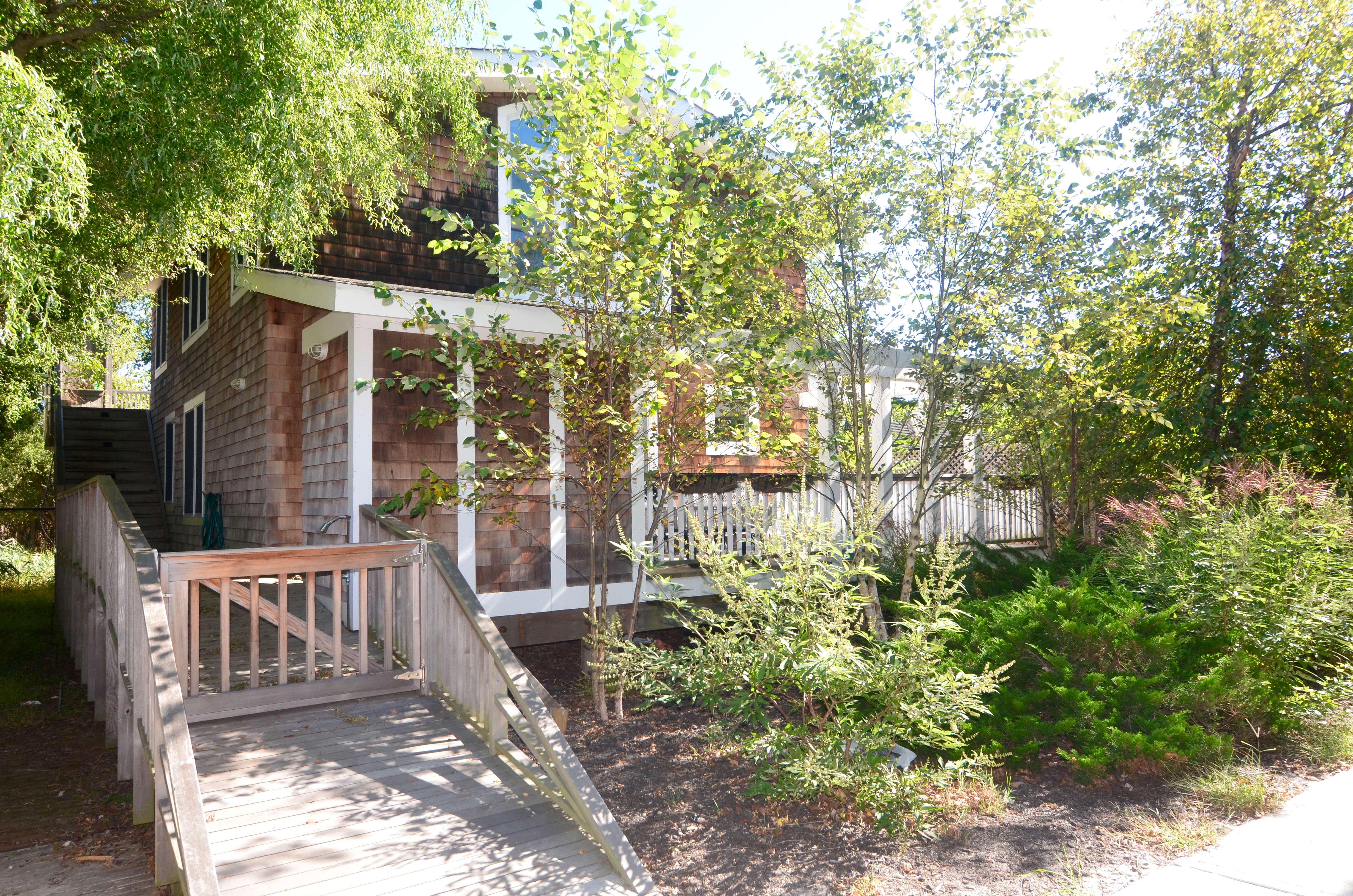 This gorgeous house has an amazing second story deck. This upside down house has a beautiful open concept living, dining, and kitchen area. 