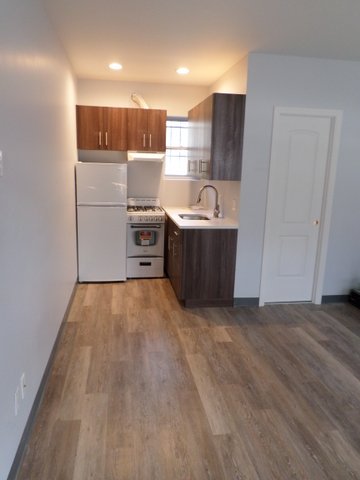 Cozy Renovated Studio Apartment For Rent In Middle Village. Features Efficiency Kitchen & 1 Full Bath Heat & Water Included. Hardwood Flooring Throughout. Close To All Shops & Transportation. Great Opportunity. A Must See!!!