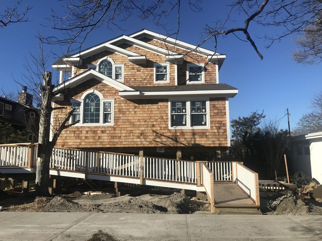 Beautiful brand new home on one of Ocean Beach's best blocks.  Prime location south of Midway!  50' X100' lot.  Large home with swimming pool.  Great layout with luxurious master suite.  Plenty of room for the whole family!