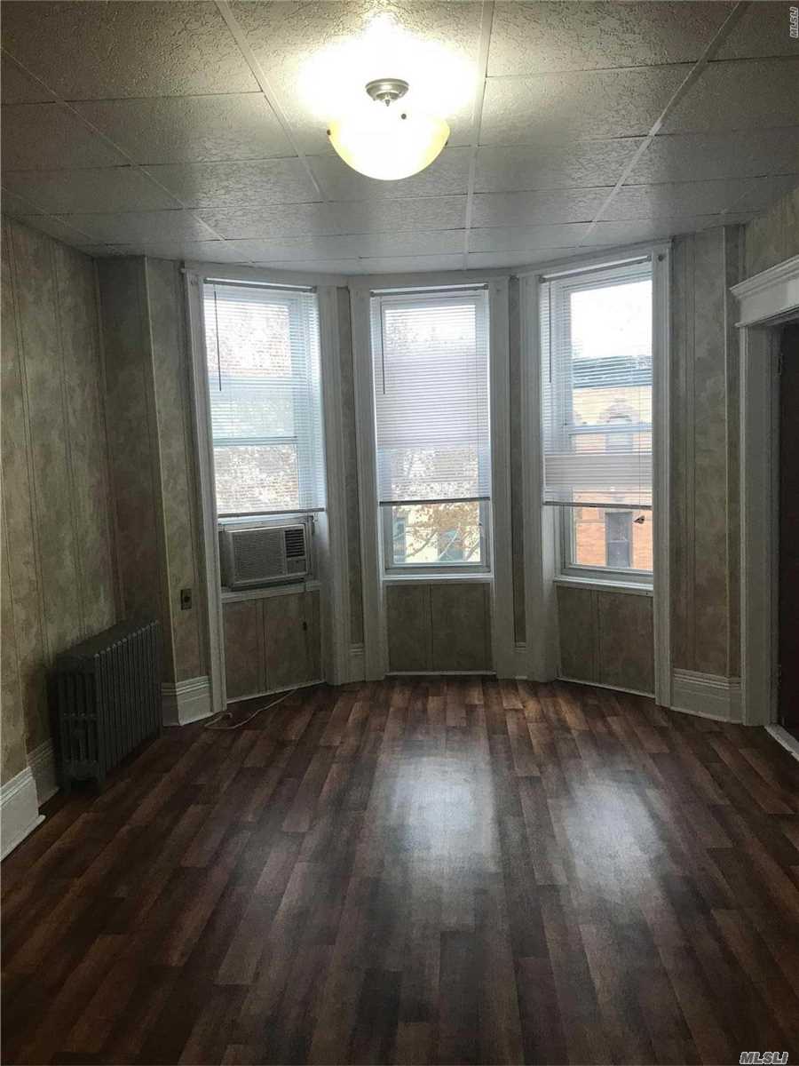 Lovely 2 Bedroom Apartment For Rent Features Living Room, Dining Room, Eat In Kitchen & 1 full Bathroom. Heat & Water Included. Hardwood Flooring Throughout. Lots Of Closet Space & Natural Sunlight. Close To All Shops & Transportation. A Must See!!