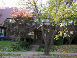 Lovely architectural grouping, large brick townhouse on Middlemay Bright cheerful home with lovely yard, finished lower level, garage, and access to a private park.