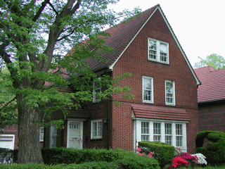 Exclusive listing-Detached brick on lovely residential street in the heart of Forest Hills Gardens.  Pleasant yard.  