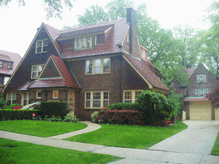beautifull semi-atached brick tudor in the heart of forest hills gardens. mint condition, finished bsmt 1 bat                            1st. Floor:  Living room w/ fireplace, sun room, formal dinning room & kichen, 1/2 bath
2nd Floor: 2  Bedrooms--1 Bath 
3rd Floor : 2 Bedroom -- 1 Bath, 1/2 bath
central air w/air filter, garage