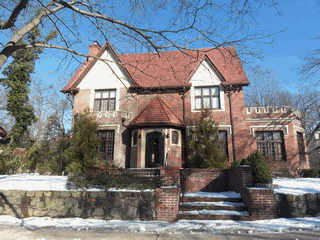 HISTORIC TUDOR! This stunning, restored to perfection home, retains its old world feeling with the warmth of wood & architectural details. A special home with the best of old & new combined with original integrity. Restoration and renovations include all modern amenities that today's family desires, 5 expansive bedrooms, 5 baths, music room, surround sound system, cac, in-ground sprinkler system, intercom & central phone system, radiant heated floors, 3 fireplaces. FDR with intricate beamed ceilings & exquisite lighting fixture. Brand new Island Style Gourmet kitchen, hardwood floors with mahogany trim. Butlers pantry complete with wine coolers, custom cabinets & bar/wet bar area. Large windows in the breakfast room overlooks the patio & garden inviting a stream of natural light and creating a serene setting. Spectacular lighting fixtures throughout. Incredible finishes & luxurious appointments including, marble floors, archways & columns, stained glass windows & french doors. Basement finished, laundry room, full bath, family room & bar room.  2 car heated garage. A one-of-a-kind, gracious home that will take your breath away! 