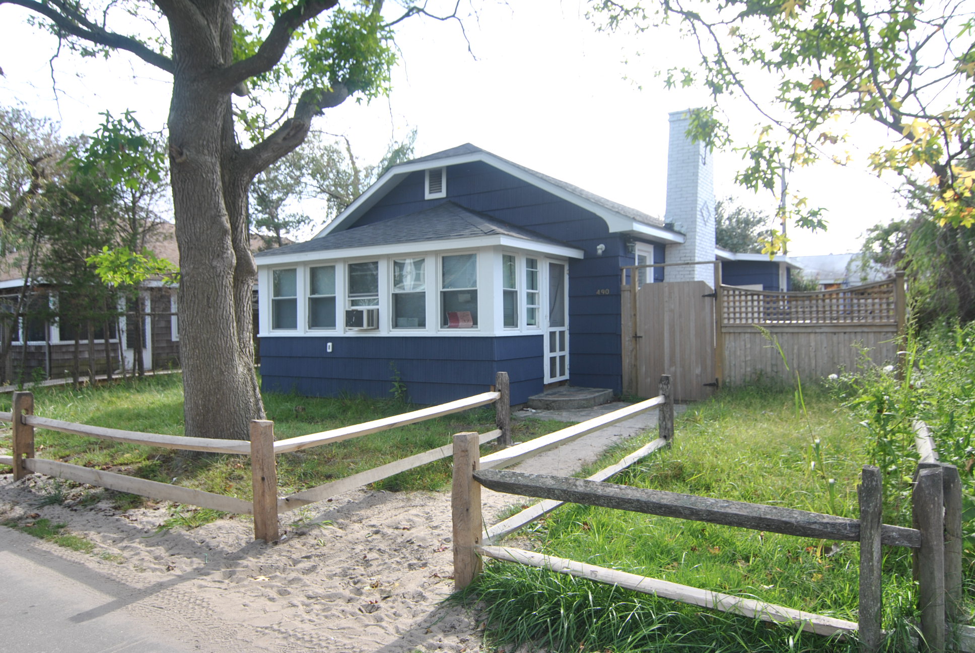 Completely renovated, one story home close to town and ferry.  Fireplace, front porch, sundeck.  