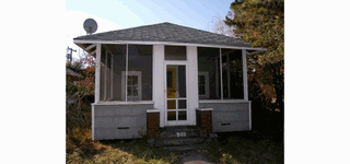 Charming golden oldie with screened in porch.  50 X 80 lot.  Quiet location.  Sunny exposure. Low taxes!