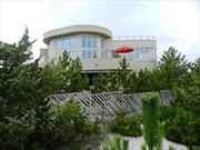 Everything view!! Ocean, Coastline, Beach, Dunes, Open land, Bay, 360 degrees!!! Last walk in Grove, adjacent to open land, facing towards the Pines. Large lot 85 x 100, and 50 feet from beach. 
Room for pool. 6 bedrooms, 4.5 baths, 3,000 sqft. home, year built in 2000 . Electric heat and 2 fire places. Spacious bedrooms all with deck entries. Master bedroom has private deck, fire place, master bath with views.  Circular kitchen with top of the line appliances, large windows with bay and ocean views. Large living room with wood floors throughout home. Multi-Decks, home office space, and much more.