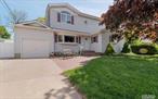 Home Sweet Home Are The Perfect Words To Capture This House Sitting Pretty On A Flat, Fenced 75X150 Lot. The Brick Paved Front Walkway Begins Your Welcome To This Lovely 4Br/2Bth Colonial. Lr W/Gorgeous French Drs To A Home Office. The Bdrms Have Lots Of Natural Light. Updtd Bths & 2nd Flr Laundry Rm. F/Fin Bsmt & Large Backyard Patio That Is Perfect For Entertaining.