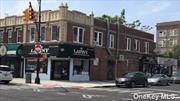 Great investment 5 units, 3 store fronts, 2 two bedroom apartments on Grand Avenue in the heart of Maspeth. Must See!