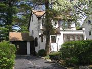 Baker Hill Gem! Great Location! 3 Brs Tudor. Lr/Fpl, Fdr, Enclosed Porch, Eik. Unlimited Possibilities.