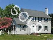 Riverhead 4 Br Colonial, 2 1/5 Baths. Offers Lovely Eik Fully Remodeled W/ Ss Appl&rsquo;s,   Lr W/ Fireplace, Form Dr, Hardwood Floors, Full Fin Basement,  2 Car Garage, And Quaint Enclosed Sun Porch.