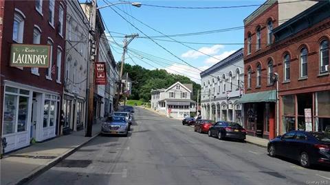 Village of Chester. Heritage Trail is in the distance within the wooded area.