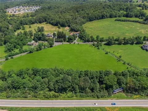 Looking approximately south, Otterkill is on left, Duck Farm Road on right, and Old Chester Road in foreground and Heritage Trail at the rear of the property. The raised trail bed and tree cover provide wonderful sound protection from the highway. Route 17M is obscured by the trees. Route 17/Quickwa