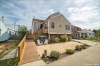 This Home is Available To Rent Weekly For $8, 400 NOT a month. Fire Island is a vacation destination. Completely Renovated Raised 4 Bedroom/2 Full Baths and Outside Showering Area. Home In The Heart Of Ocean Beach. Private Fenced Rear Deck With Outside TV, Large and Ample Seating. This Home Comes Perfectly Ready With Partial Bay Views, 4 Bikes, 5 Beach Chairs And A Wagon!, Additional information: Appearance: Great