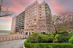 Wall of windows in living room and dining area in this 2 Bed / 2 bath beauty. Spacious apartment with galley kitchen, Light and bright bedrooms. Building boasts private park, seasonal pool parking.