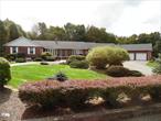 RECENTLY REDUCED This 2.4 acre Mini-Estate is ready for your family. The home features a spacious floor plan throughout, five large bedrooms including the master suite with master bathroom suite including a jacuzzi and sauna. The main living area has beautiful hardwood floors throughout. The custom kitchen is fully equiped with energy star appliances, custom cabinets, a walk-in pantry and has plenty of space for cooking and entertaining. A living area has a beautiful brick fireplace, a second formal living room and near by a spacious formal dining room. The lower level is a large open plan, custom built in wet bar, large family room, two bonus rooms for a home office or a quite room and has central-air conditioning. This October the seller just installed new hardwood floor in the finished basement. Your professionally landscaped outdoor oasis awaits with a large fenced-in backyard and separate in-ground pool a large entertainment patio area. Along with the custom designed playhouse, a tennis court, a paddle board court and a miniature golf course. Property is only minutes from the Resorts World Casino , Kartrite Indoor Water Park, The Monticello Motor Club and Bethel Woods. MOTIVATED SELLERS! Additional Information: Amenities:Storage, Tennis, ParkingFeatures:2 Car Attached,