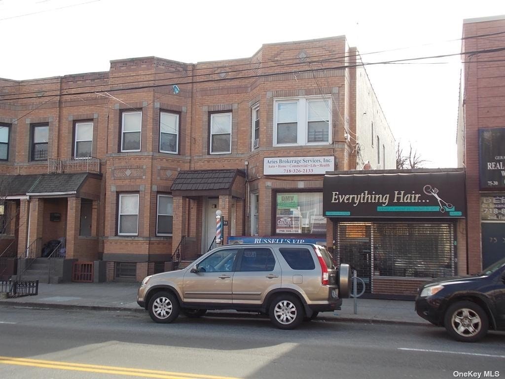 Great opportunity to purchase this mixed use building on Metropolitan Avenue in Middle Village on Metropolitan Avenue. 3 resdiential units and 3 commercial units. Great exposure!