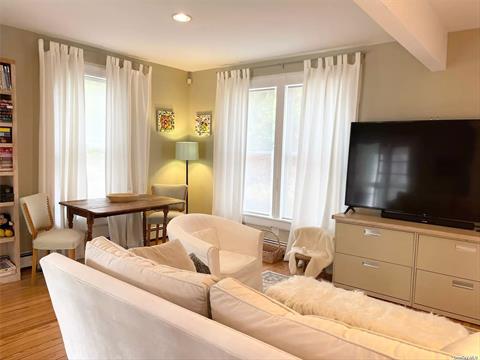 Downstairs Room With Large Flat Screen TV