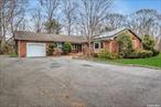 Sprawling 3br/3.5 Ranch with a bright & spacious floor plan. Kitchen with stainless steel appliances, large dining area & tons of natural light from the wall of windows that overlooks beautiful flat property. Formal living room with warm and inviting brick fireplace. Great room with a high vaulted ceiling and accent beams boasts the ability to entertain a bar setup. Two new baths (master will be finished). Hw floors throughout. Hi-hat lighting. Skylights. Full, partially finished basement has tons of storage space and room for guests or office. Close to shopping, RR, transportation, entertainment and more...