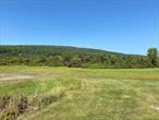 Spectacular 70 acre parcel located right outside the village of Highland. May be used as a farm or subdivided. Parcel has 3 rentals located on it in addition to 1 vacant house. Also on this property is a very large steel building with high ceilings and oversized garage doors as well as a barn! Close commuter location - Metro North, NYS Thruway, Mohonk Mountains and Hudson Valley Rail Trail. Endless opportunities await you