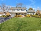 Pride of Ownership shines throughout this bright and spacious 4 bedroom, 2.5 bath Colonial that is situated perfectly on a professionally manicured half acre lot with gorgeous perennial gardens that can be viewed from the 3 seasons room. The main floor has an ebb and flow floor plan that is ideal for entertaining. Large formal dining room features a wood burning fireplace and seating to easily accommodate the largest of gatherings plus French doors to the beautiful yard. Eat-in-kitchen with plenty of natural lighting and storage. There are multiple custom built-ins on the main level, from the living room to the private sitting room. Main floor laundry. Primary bedroom en-suite features a soaker tub and shower, plus a walk in closet. There is a unique pocket door to allow 2 of the additional bedrooms to become one, if you choose. Truly a home to be enjoyed by anyone that lives here...