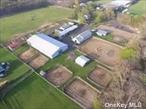 Barn for Lease, 12 Acres, 60 stalls, Indoor arena, Hot walker, 2 outdoor arenas, Round pen, Trail arena, Office, 2 living trailers for grooms, All equipment, phone, and internet included. Term of lease negotiable.