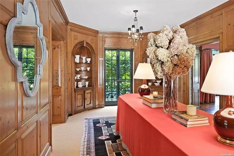 Stone Fireplace and Paneled Walls