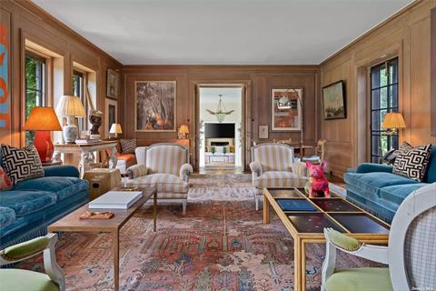 Stone Fireplace and Paneled Walls