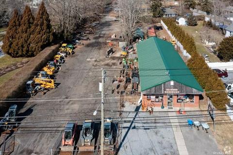 AERIAL OF BUILDING AND LOT