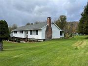 Just outside of the quaint and bustling hamlet of Livingston Manor, sits this beautifully maintained, 3, 000 square foot estate. Not only does this residence provide an abundance of space, it is situated on 7+ of the finest Catskill acres. When the season is warm and bright, enjoy the large in-ground pool, expansive deck and patio, attached sunroom, and well manicured property. Enjoy a priceless view of the world renowned fall colors of the Catskill Mountains and cozy up to the two wood burning fireplaces that don the living room and finished den area. In the summer months, entertain family and friends on your deck and by your in-ground pool. When a chill hits the air, bring the gathering inside to the finished den space with wood burning fireplace and custom made bar. Hosting holiday dinners will be a breeze in the large and beautiful kitchen with eat-in dinette. Attached 2-car garage for ample storage. 2.5 hours from NY and 3 miles from State Route 17.