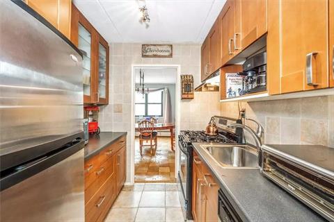 Great updated kitchen with stainless steel appliances and custom cabinets