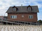This Home is Available To Rent Weekly For $12, 000 NOT a month. Fire Island is a vacation destination. Oceanfront 5 bedroom, 2 bath Unique Cape Cod with Views from Every Window. Open Layout Living Room, Dining Room & Kitchen with Cathedral Ceilings. Enjoy the Sprawling Deck with Outdoor Shower & Incredible Ocean Views. Perfect for Entertaining.,