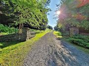 This tranquil 5.25+/- acre building lot is the perfect choice for nature lovers and those who want their privacy. Located in The Highlands, a premier gated country community just across the street from Bass Master Hunter Lake. Small upscale secure community puts privacy, peace and serenity at the forefront, and is very near to all the beauty and fun that the Sullivan County Catskills has to offer yet makes you feel worlds away. Enjoy the small babbling brook that runs through this beautifully sloping and level lot nestled in nature. Loaded with abundant wildlife and a mix of evergreen and deciduous trees. There appears to be a potential pond sight and lovely stonewalls meander through the property. Jaketown brook snuggles up to the rear according to the maps. This beautiful homesite is just minutes from Bethel Woods Center for the Arts, area lakes, hiking trails, Resorts World Casino, Kartrite Water Park, Monticello Motor Club, great restaurants and more!