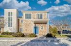 Tons of morning sun beams through this east-facing newly constructed Townhome. The open floorplan features a custom kitchen with matching appliances and cabinets with a gas stove, a double-door refrigerator, and a quartzite countertop with room for seating. Enjoy the poolside deck while having your morning coffee. The second floor features 2 bedrooms with a shared custom bedroom bathroom and each bedroom has its own private deck.