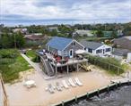 Bay Front Living & Spectacular Sunsets from the Deck of this Bayfront Beach House. This Home has Just been Entirely Remodeled with 4 Bedrooms, 2 Full Baths. New Pictures Coming Soon! Sleeps 12 Comfortably.