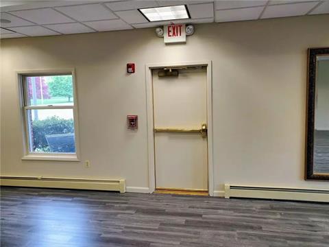 From office and looking toward lobby; closet shown.