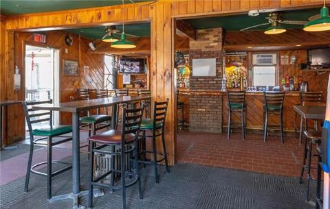 Seated at the bar, one has view of the river from the windows.