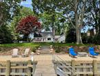 Enjoy an experience on the North Fork of LI this summer. Whether a couple of weeks, a month, or the whole season, spend it nestled in a quiet spot that is near downtown Southold. Feel embraced by all the NOFO has to offer in this meticulously renovated, waterfront Cape, while enjoying the utmost in privacy and waterfront access. Step down into your own private swimming spot in clear Jockey Creek or enjoy your own private deep-water dock (bring your boat!). Kayak, canoe or paddle directly to Southold Bay, Shelter Island Sound and the extended fishing grounds of Greenport, Bug Light, Orient and beyond. Enjoy a quick ride into the charming downtown of Southold for elegant dining, shopping and easy access to LIRR/Jitney into NYC. Make lasting summer memories on this expansive idyllic, half acre, creekfront property which is perfect for quiet time, entertaining on the deck or play., Additional information: Appearance:excellent STRP#0655