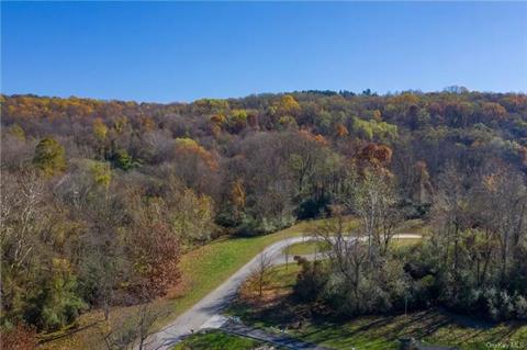 The property slopes gently upward, and is free of wetlands or flood zones.