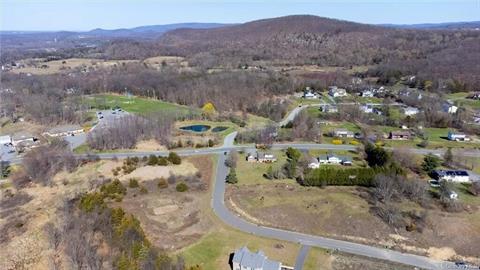 Looking up from your backyard, your home can be set on this beautiful lot on this lovely established street!