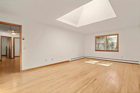 Spacious Primary Bedroom with an oversized walk in closet and Bathroom.