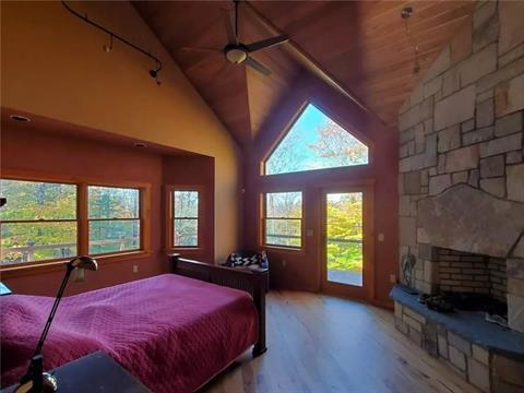 lower level sitting area with fireplace