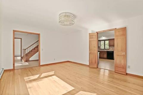 Formal Dining room with a Bay window and doors to Family Room