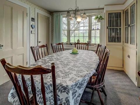 This light filled 3 season screened in porch will be your favorite place to relax, have breakfast or dinner watching the sunset!