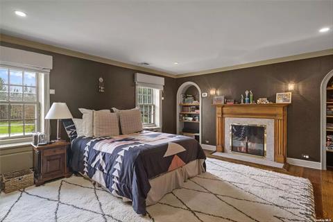 Primary bedroom with fireplace